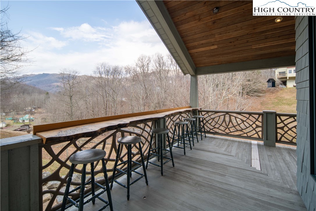 442 Aldridge Road Banner Elk, NC 28604 - Photo 48 of 50 a view of a chairs and table on the wooden floor