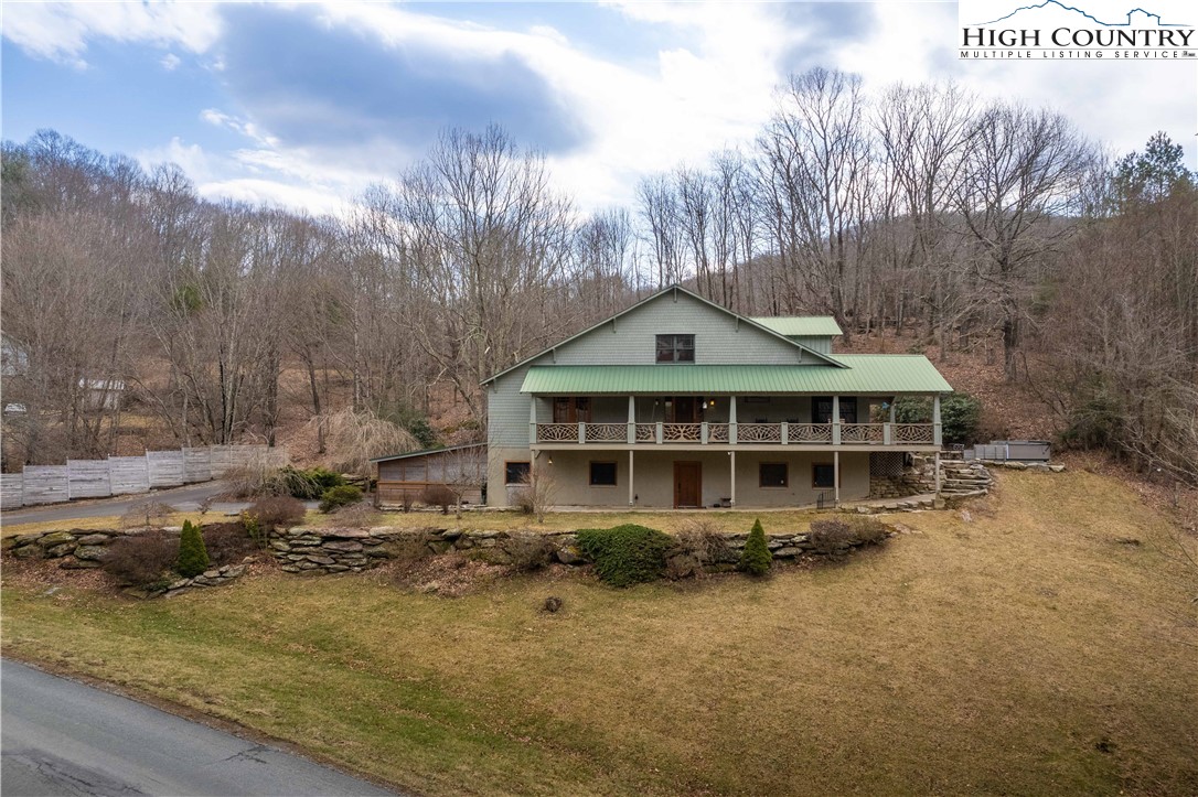 442 Aldridge Road Banner Elk, NC 28604 - Photo 49 of 50 a view of a house with a yard