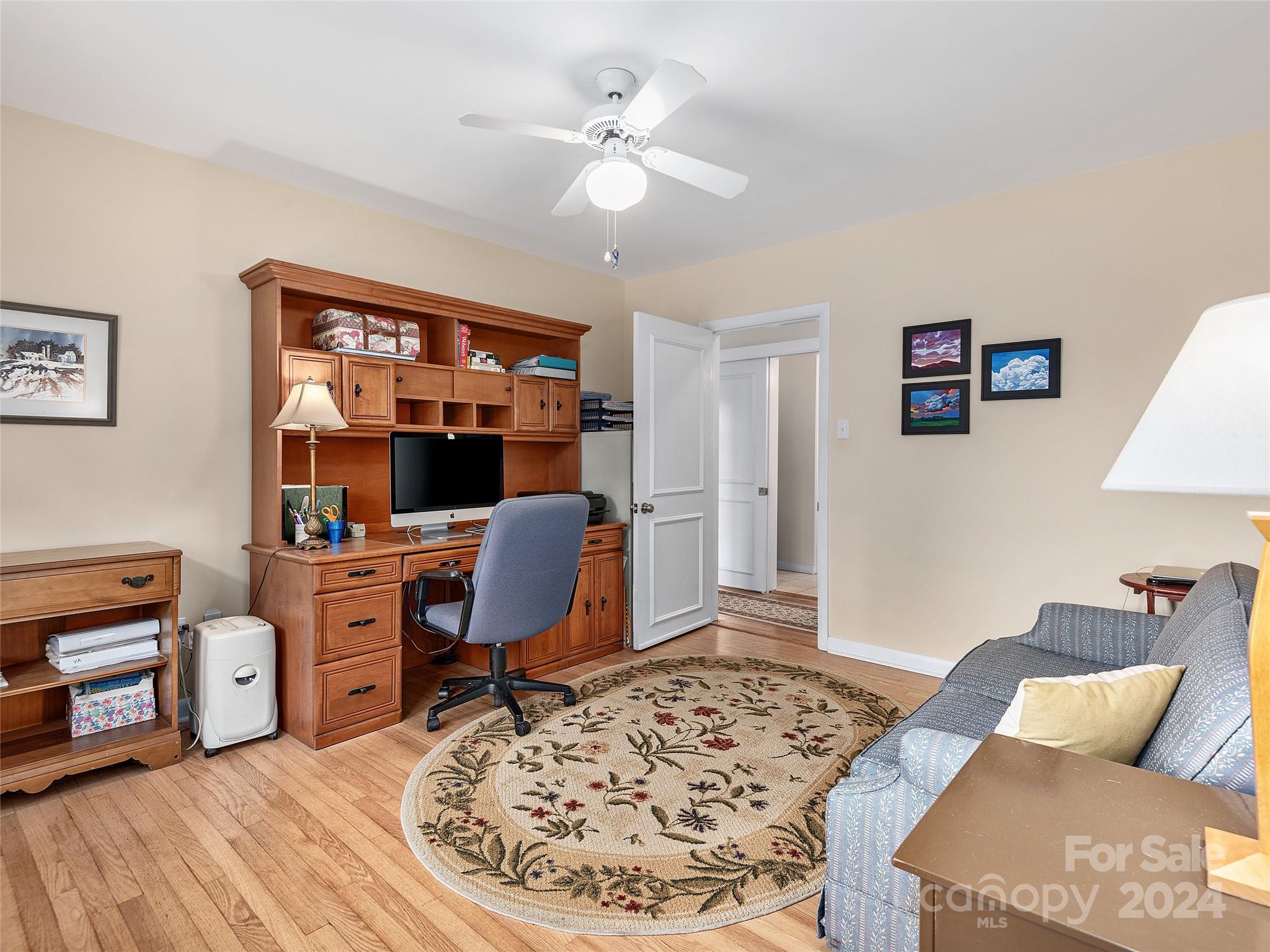 175 Rogers Street Clyde, NC 28721 - Photo 17 of 35 a workspace with furniture and window