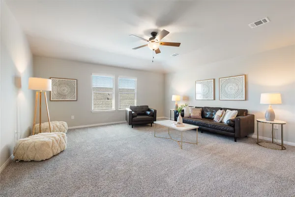 a bathroom with a sink a toilet and bathtub