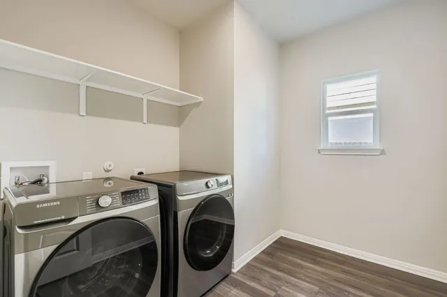 a utility room with dryer and washer