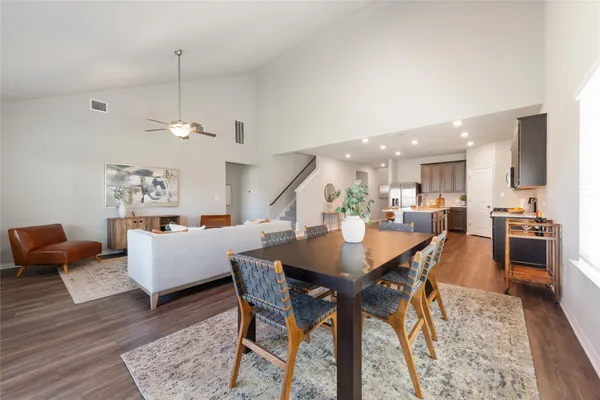 a en suite bathroom with a double vanity sink and a mirror
