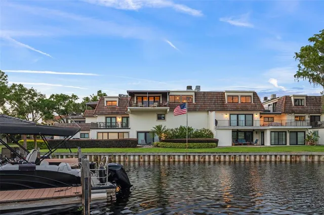 a view of houses with an ocean from a lake view