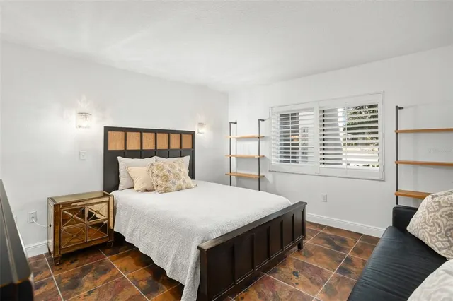 a view of a lake with a house in the background