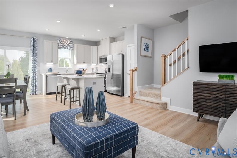 2132 Old Lime Road Sandston, VA 23150 - Photo 3 of 9 a living room with fireplace furniture and a flat screen tv