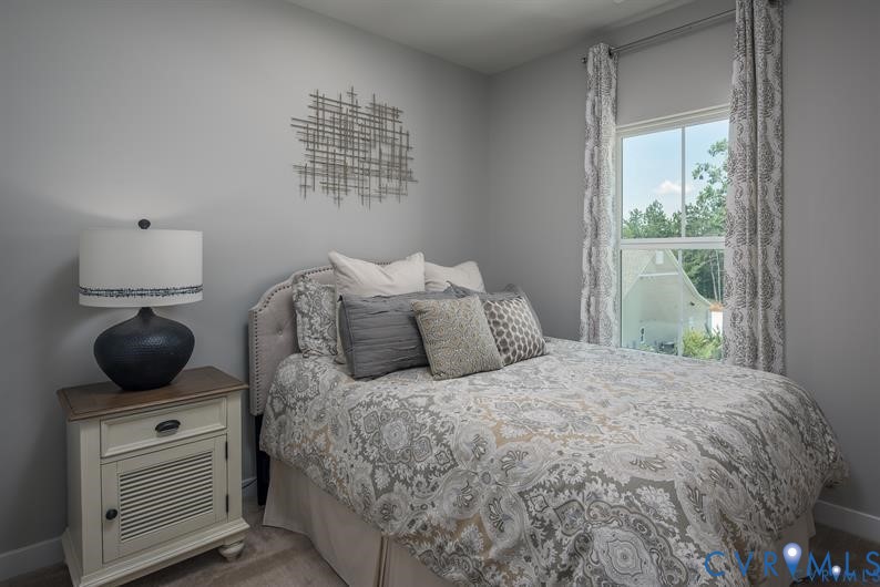 2132 Old Lime Road Sandston, VA 23150 - Photo 6 of 9 a bedroom with a bed and window