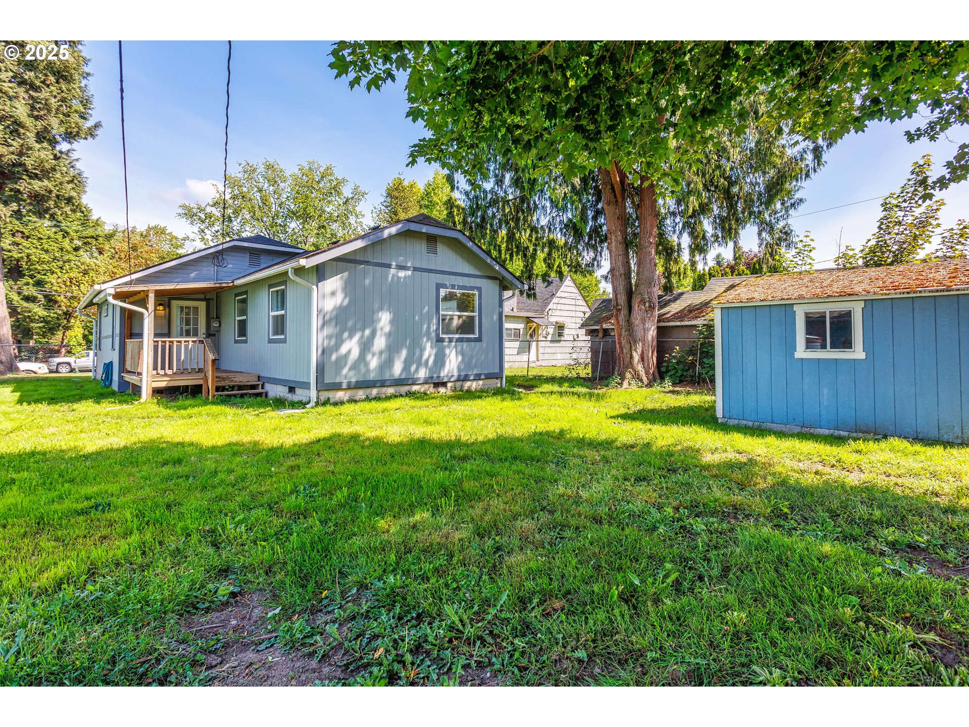 1617 7th Avenue Longview, WA 98632 - Photo 22 of 23 a view of a house with a yard