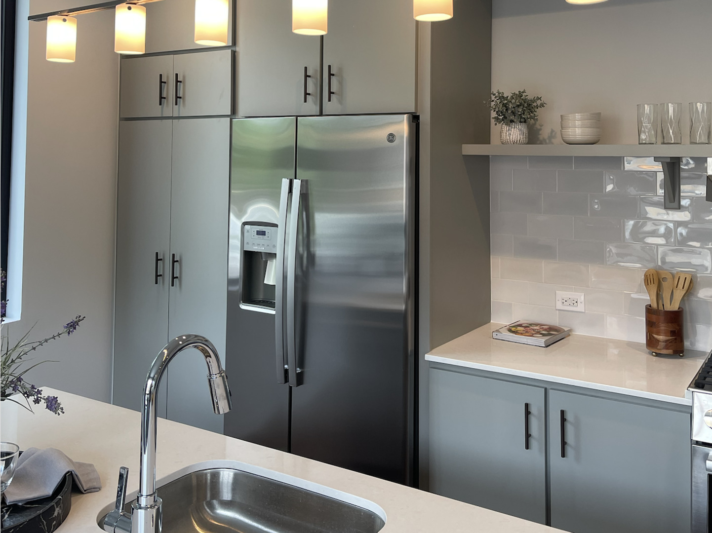 5691 North Ridge Avenue, Unit 201 Chicago, IL 60660 - Photo 11 of 31 a kitchen with a sink and refrigerator