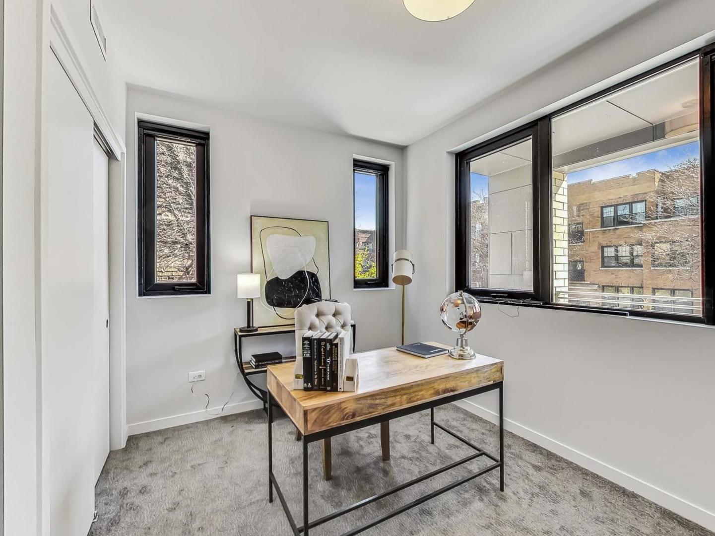 5691 North Ridge Avenue, Unit 201 Chicago, IL 60660 - Photo 24 of 31 a view of a workspace with furniture