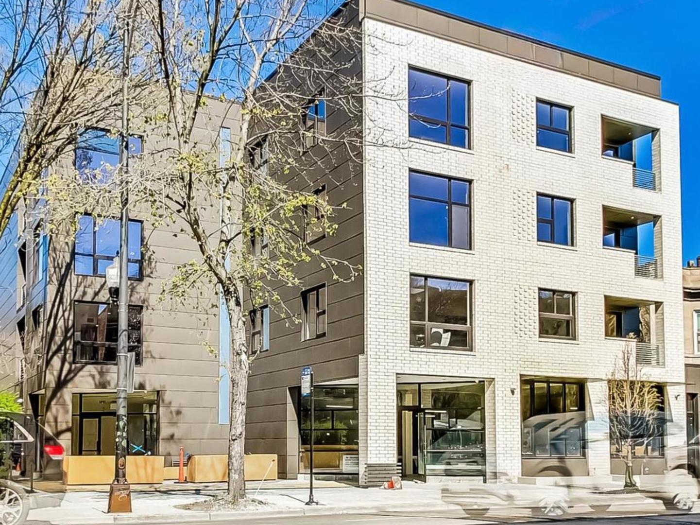 5691 North Ridge Avenue, Unit 201 Chicago, IL 60660 - Photo 29 of 31 a view of a building with a street