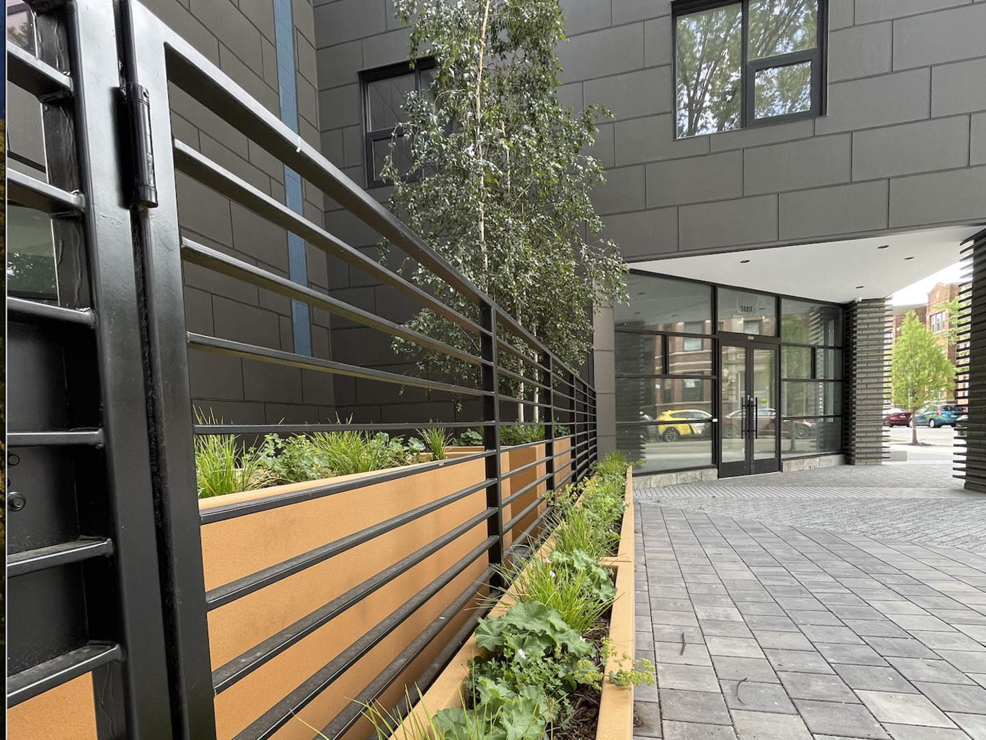 5691 North Ridge Avenue, Unit 201 Chicago, IL 60660 - Photo 4 of 31 a view of a pathway of a building
