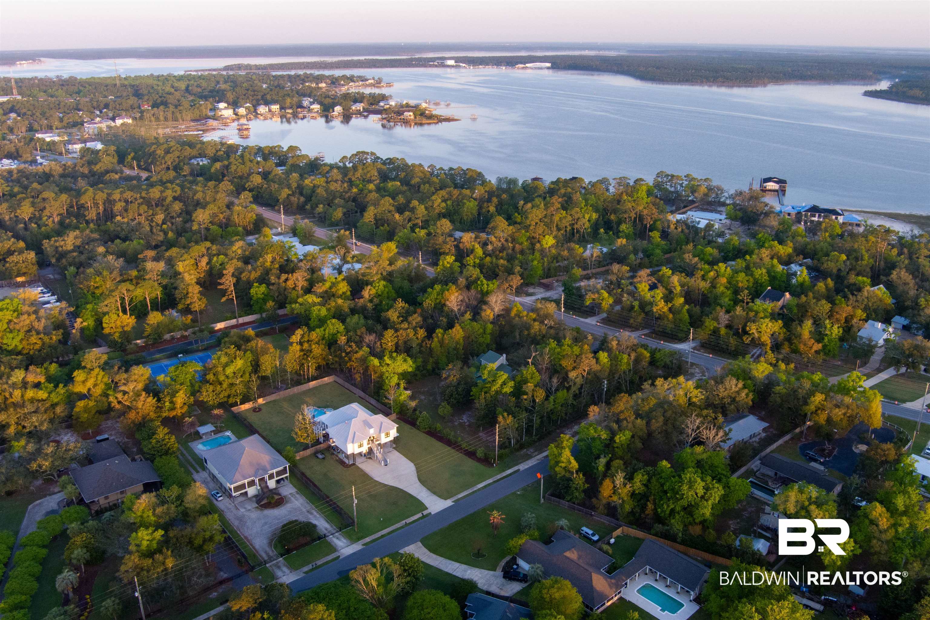 28290 Canal Road Orange Beach, AL 36561 - Photo 27 of 32 Aerial view at dusk featuring a water view