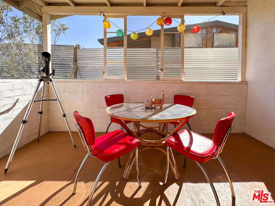 61855 Valley View Circle Joshua Tree, CA 92252 - Photo 32 of 59 a view of a chairs and table in the balcony