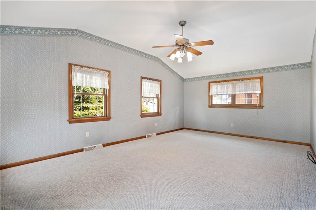 106 Fenway Road Pittsburgh, PA 15209 - Photo 13 of 25 an empty room with windows and fan