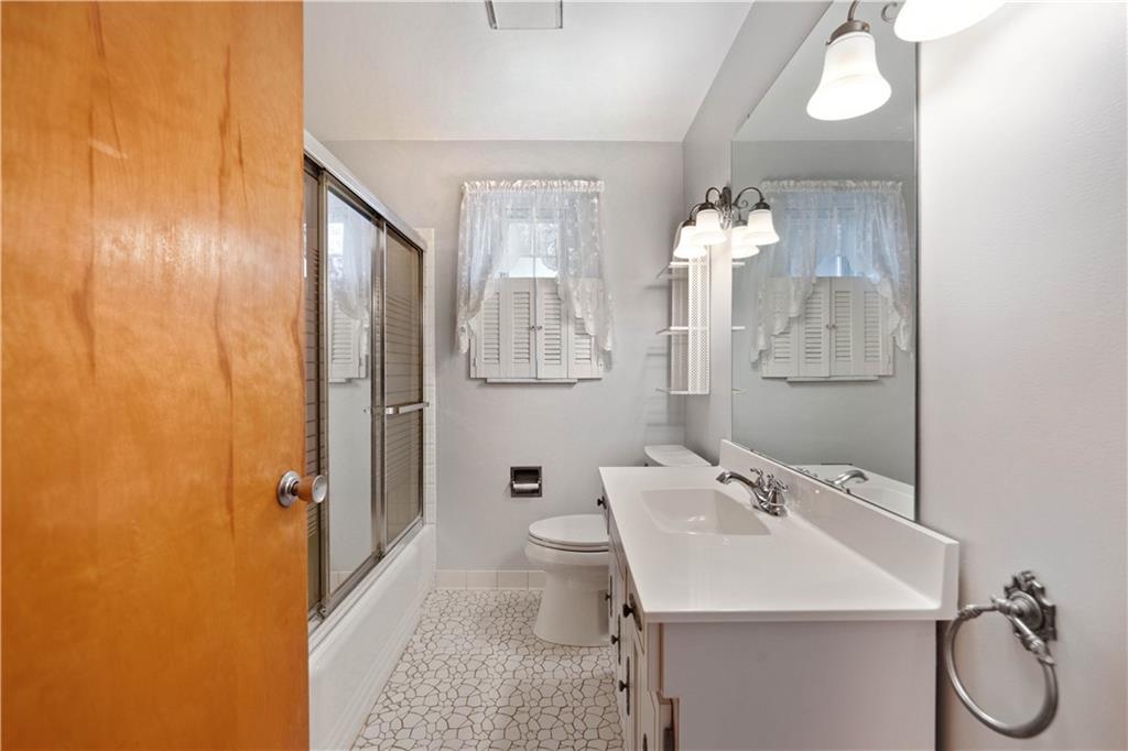 106 Fenway Road Pittsburgh, PA 15209 - Photo 18 of 25 a bathroom with a sink a toilet and shower