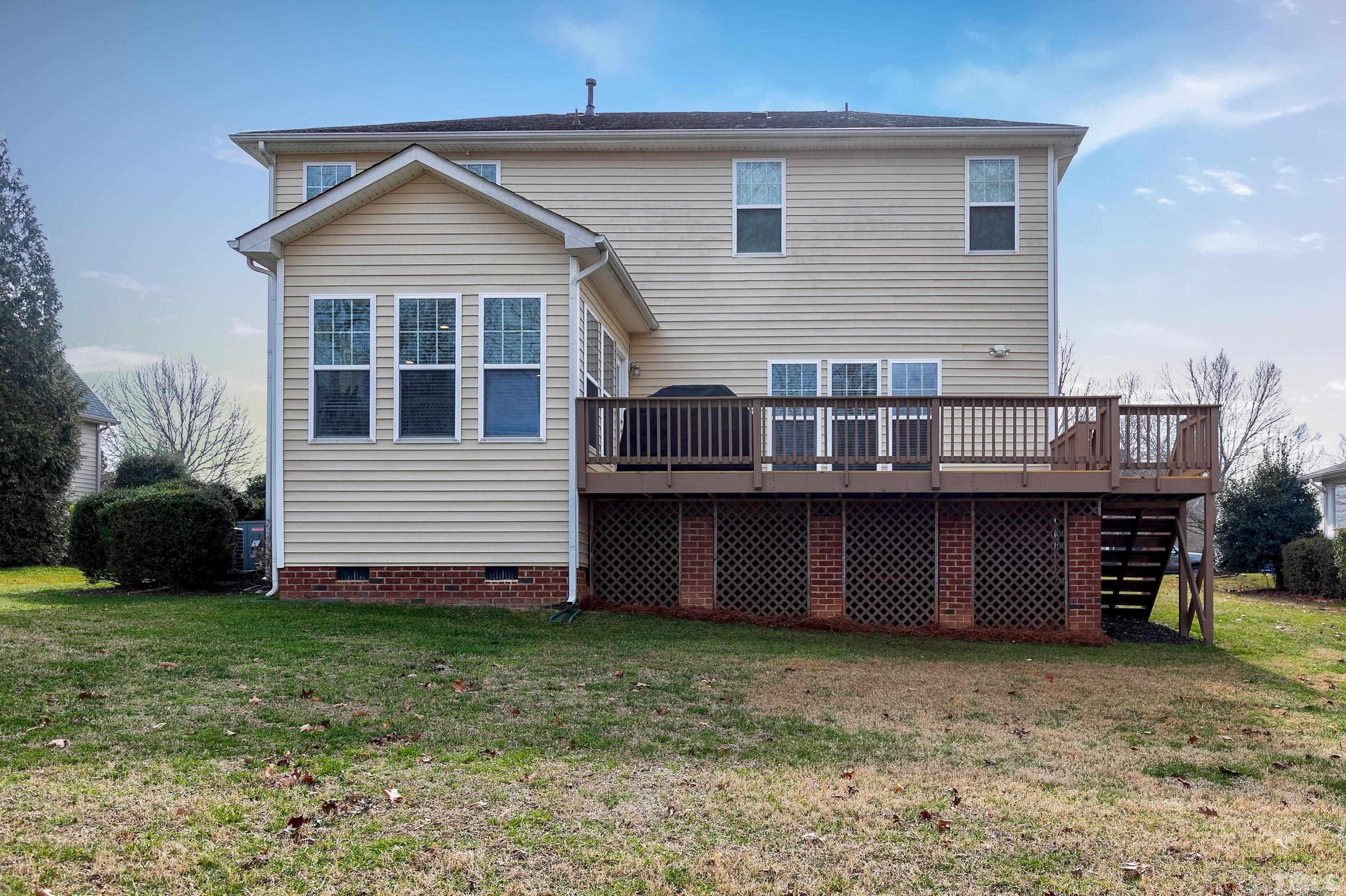 891 Seastone Street Raleigh, NC 27603 - Photo 30 of 51 a view of a house with a yard