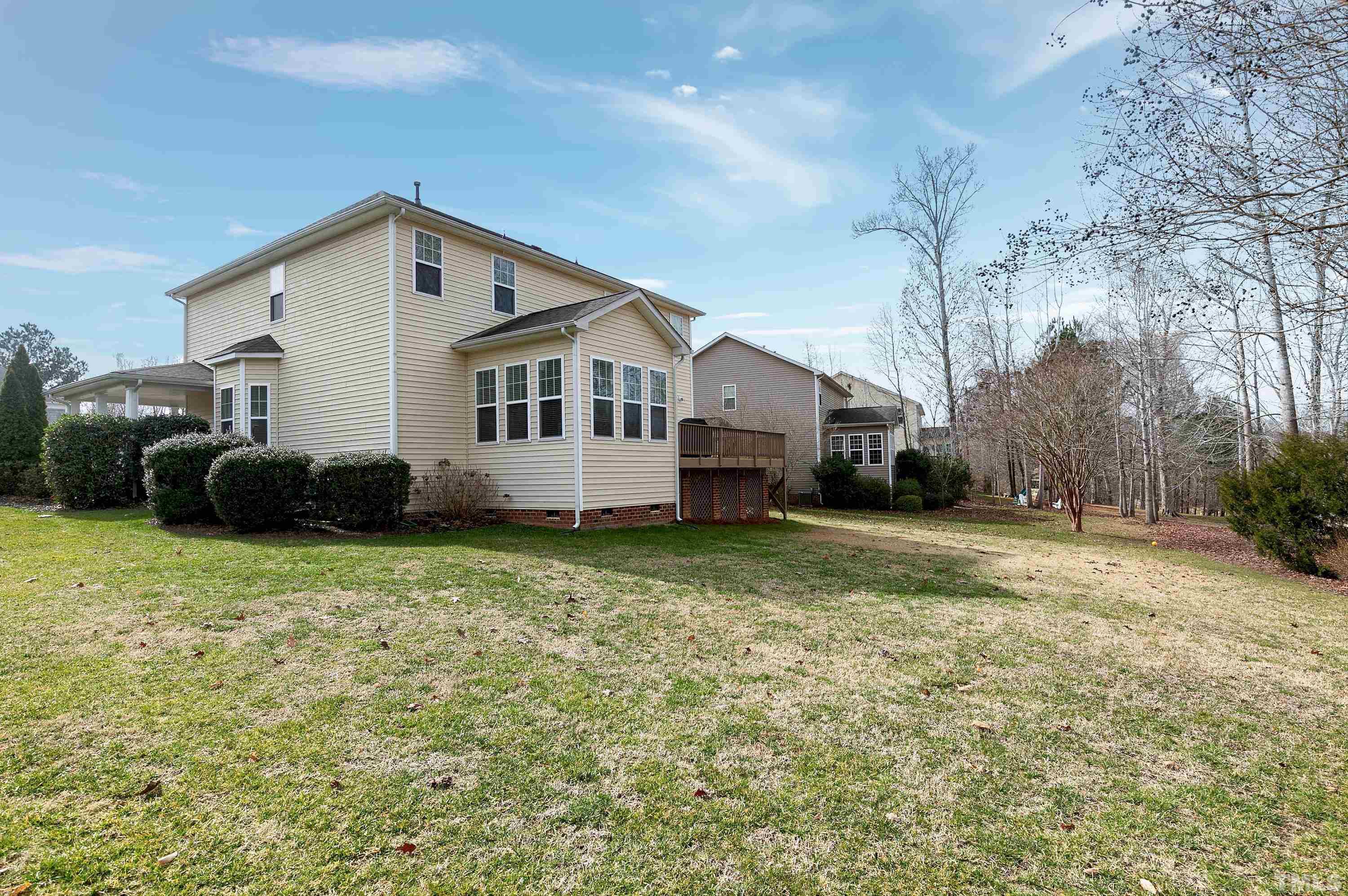 891 Seastone Street Raleigh, NC 27603 - Photo 32 of 51 a house view with a garden space