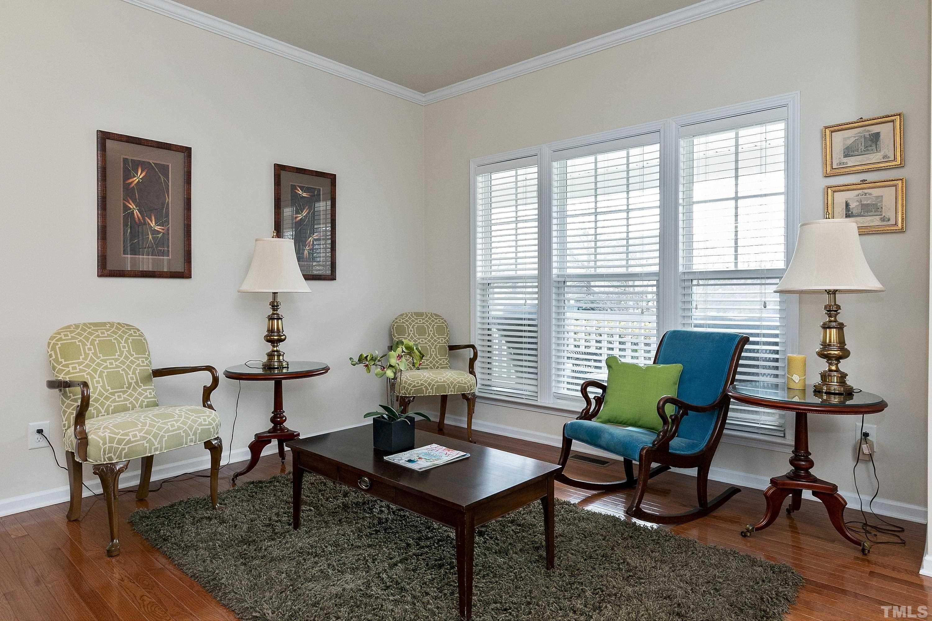 891 Seastone Street Raleigh, NC 27603 - Photo 6 of 51 a living room with furniture and a window