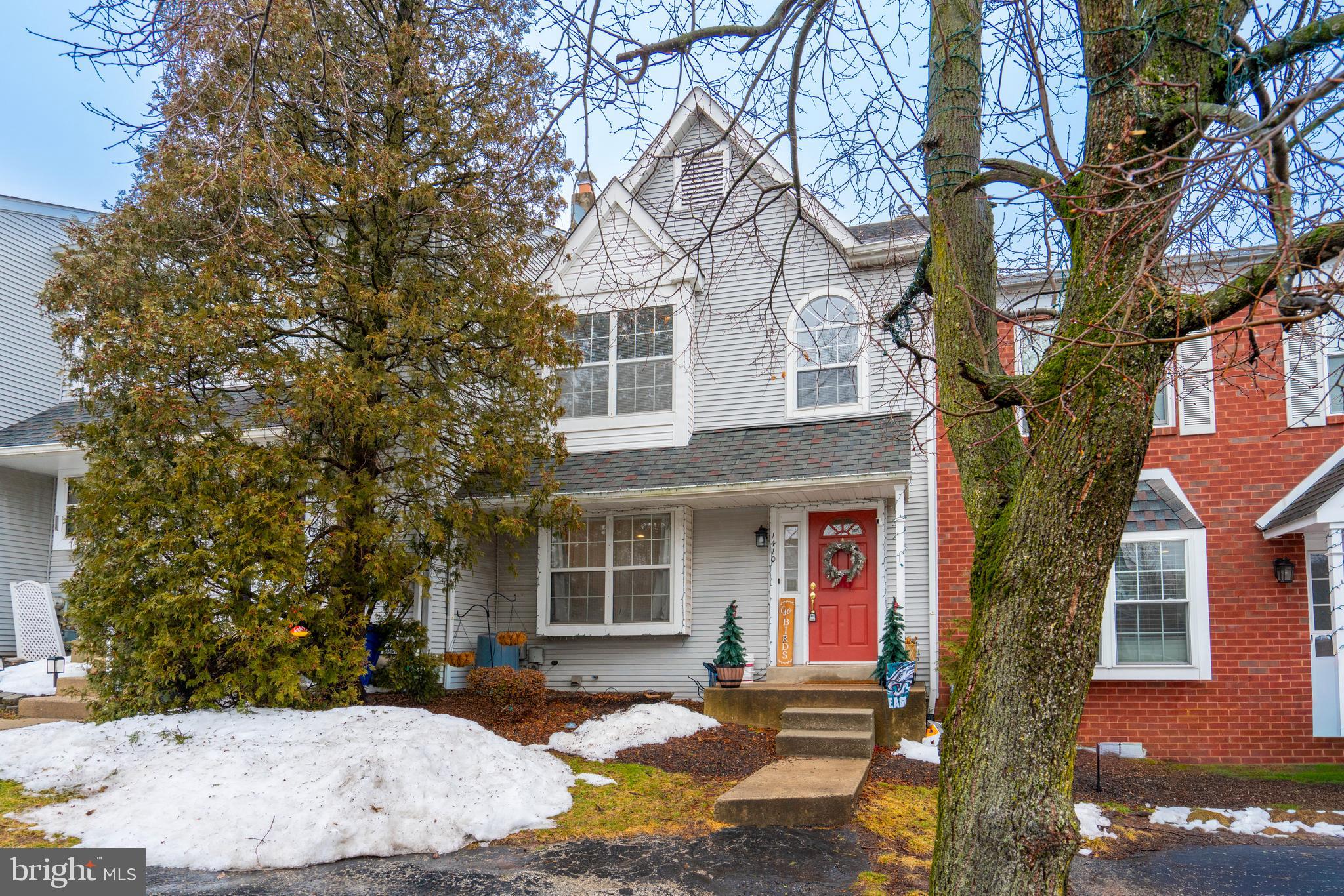 1410 Sentry Lane Eagleville, PA 19403 - Photo 2 of 32 a front view of a house with a yard