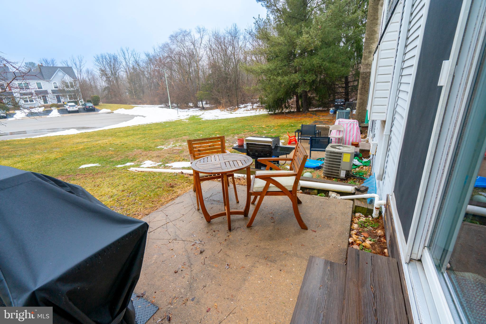1410 Sentry Lane Eagleville, PA 19403 - Photo 29 of 32 a view of swimming pool with outdoor seating and plants