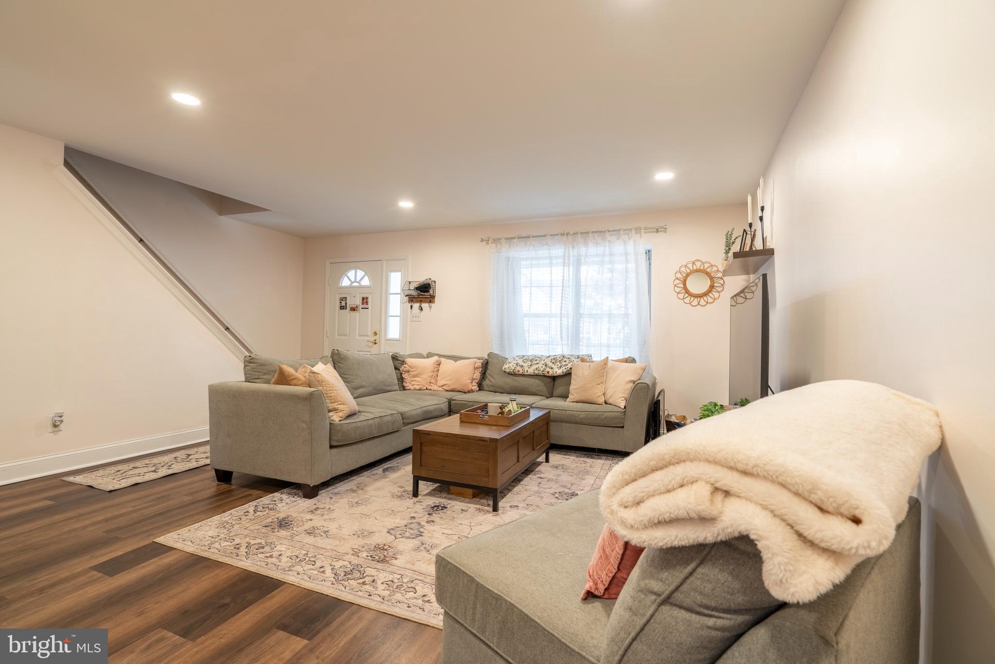 1410 Sentry Lane Eagleville, PA 19403 - Photo 7 of 32 a living room with furniture and a window