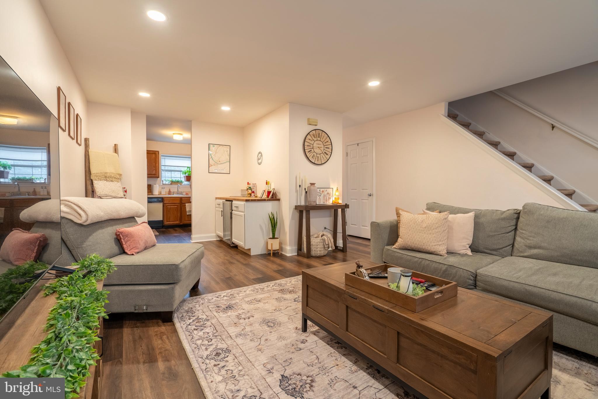 1410 Sentry Lane Eagleville, PA 19403 - Photo 10 of 32 a living room with furniture and a wooden floor