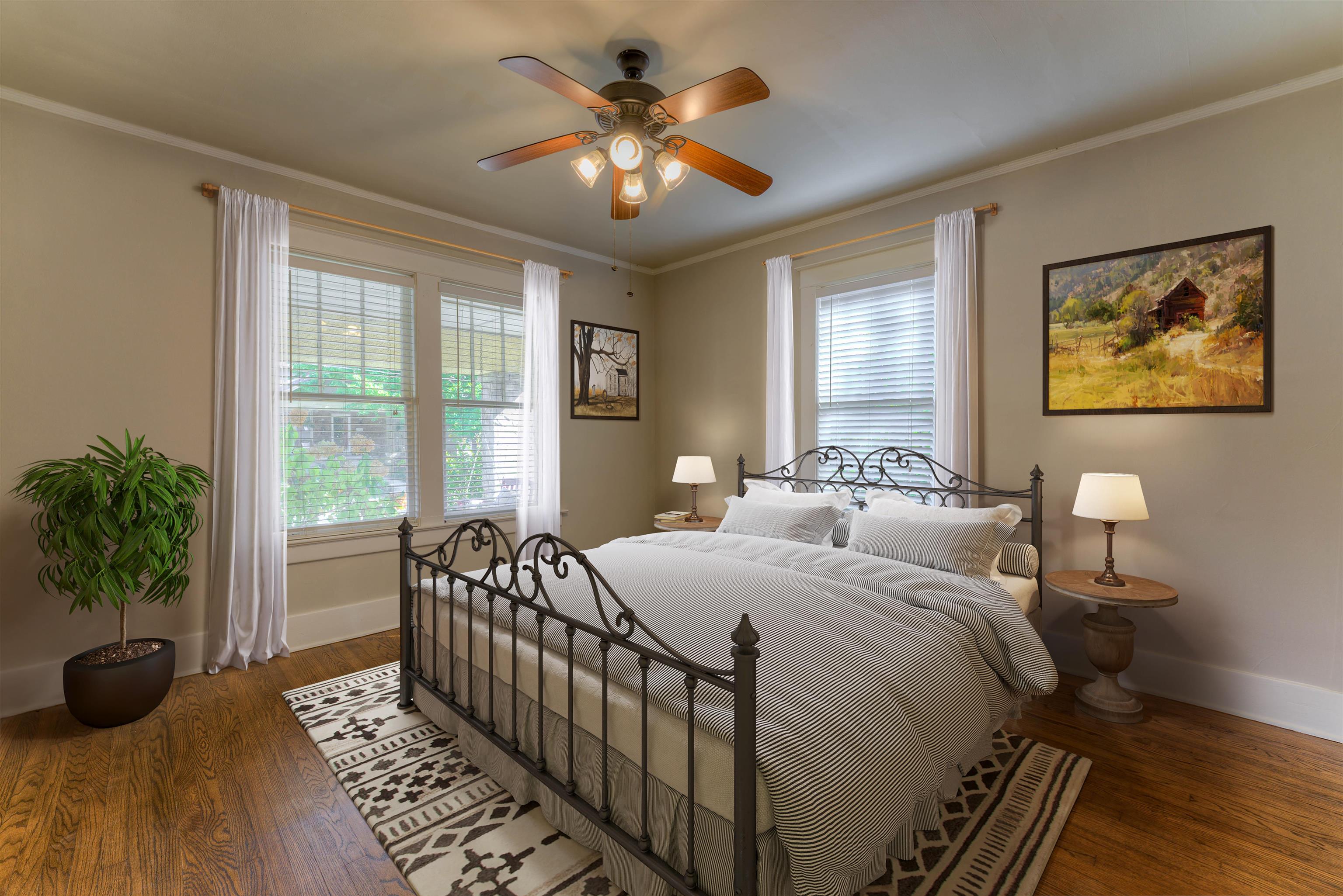 191 Lemaster Street Memphis, TN 38104 - Photo 3 of 27 Bedroom featuring dark wood-style floors, crown molding, and ceiling fan