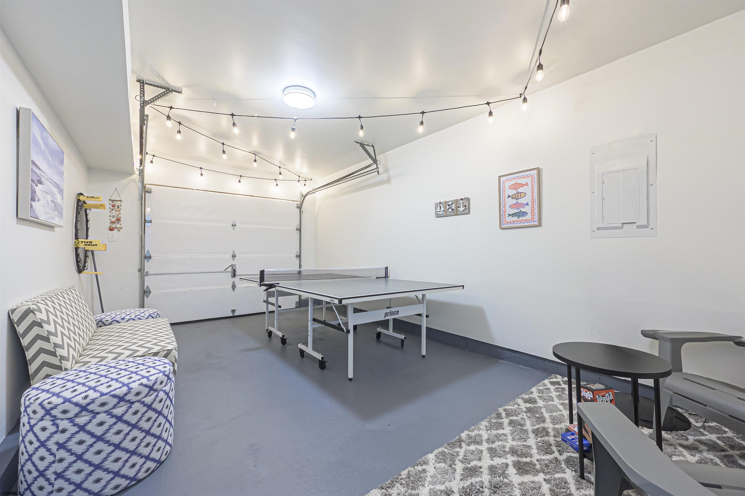 162 39th Street South, Unit 162 Brigantine, NJ 08203 - Photo 15 of 16 a living room with furniture and a table