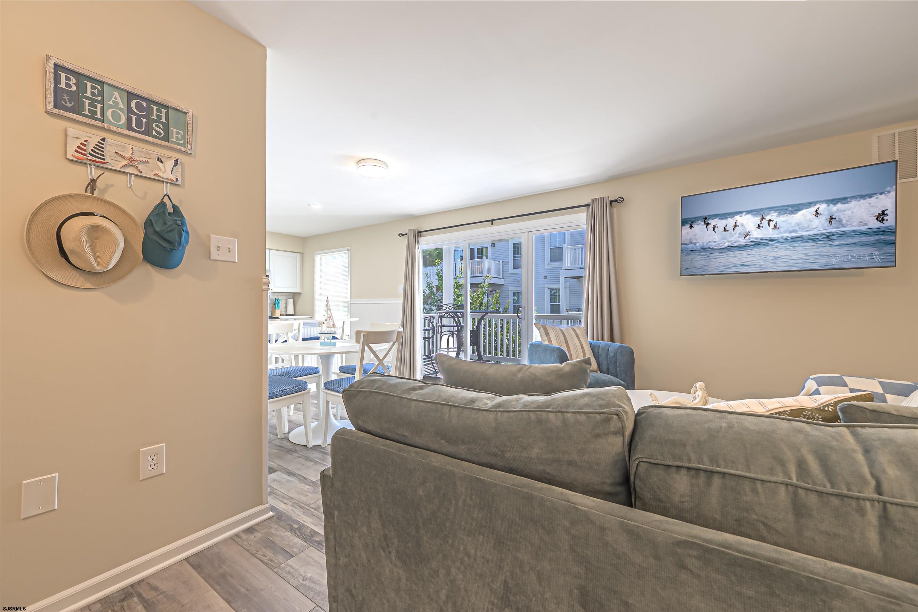 162 39th Street South, Unit 162 Brigantine, NJ 08203 - Photo 4 of 16 a bedroom with a bed and a window