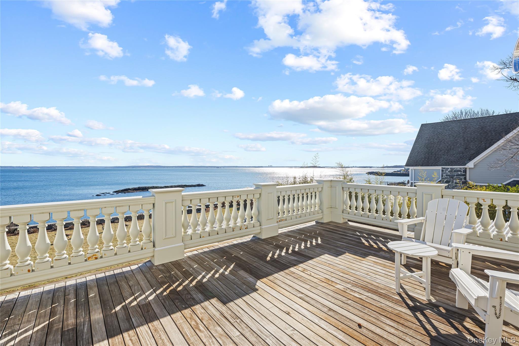 106 Premium Point New Rochelle, NY 10801 - Photo 24 of 44 a view of a balcony with wooden floor