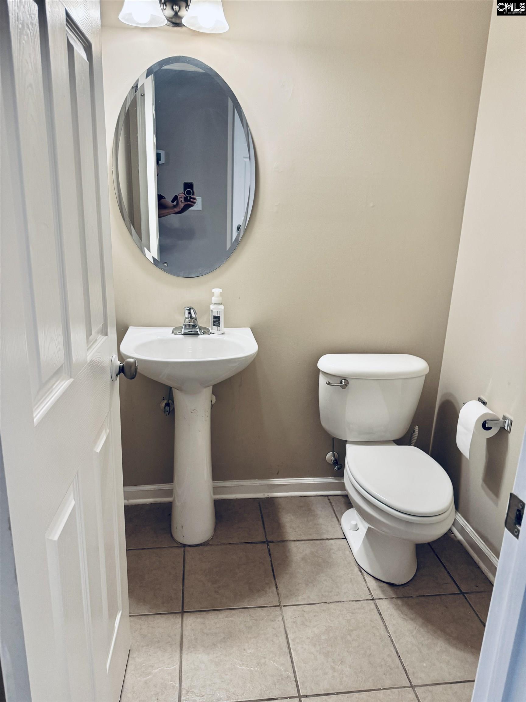 108 Tuscany Court Irmo, SC 29063 - Photo 7 of 13 a bathroom with a toilet sink and mirror