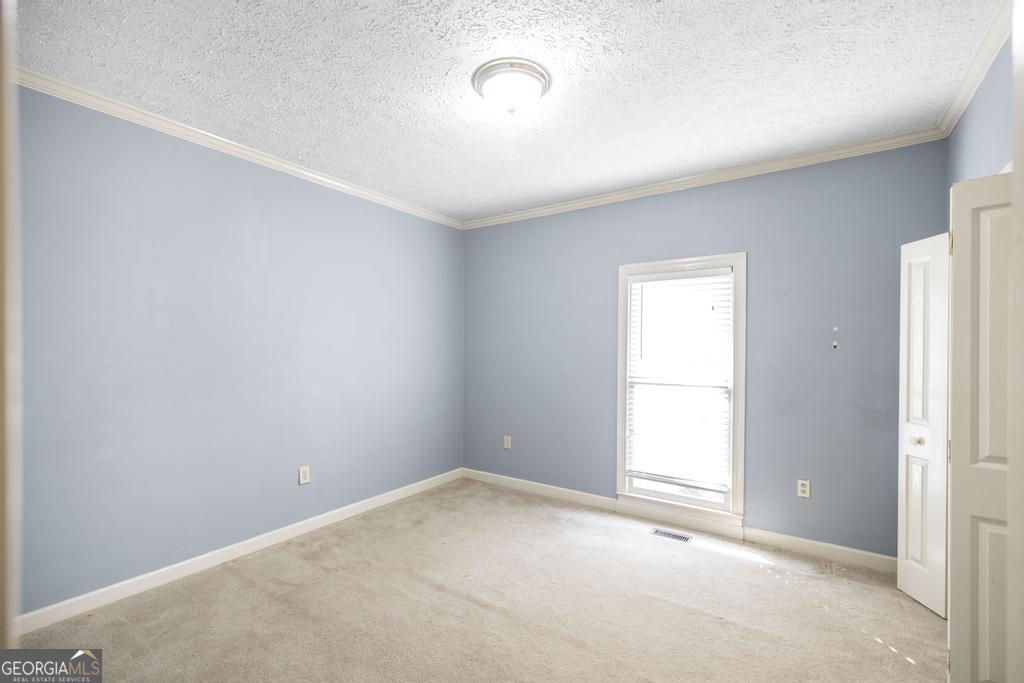 3077 River Ridge Drive Macon, GA 31204 - Photo 26 of 35 an empty room with windows