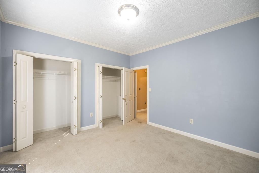 3077 River Ridge Drive Macon, GA 31204 - Photo 27 of 35 an empty room with closet area