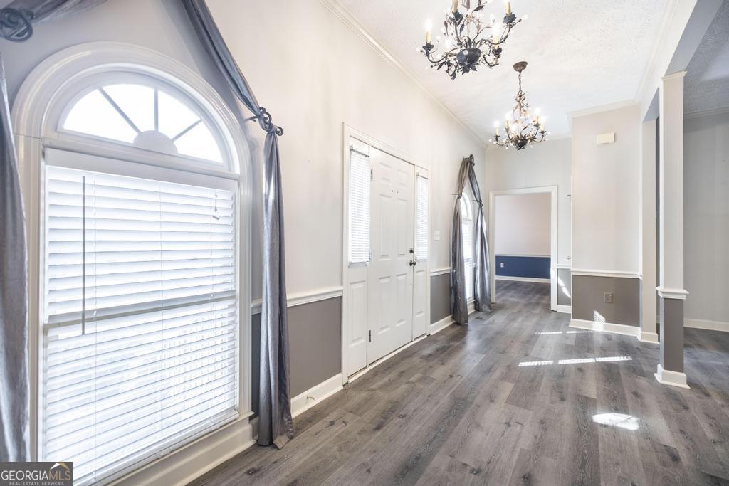3077 River Ridge Drive Macon, GA 31204 - Photo 8 of 35 a view of a livingroom with wooden floor and entryway