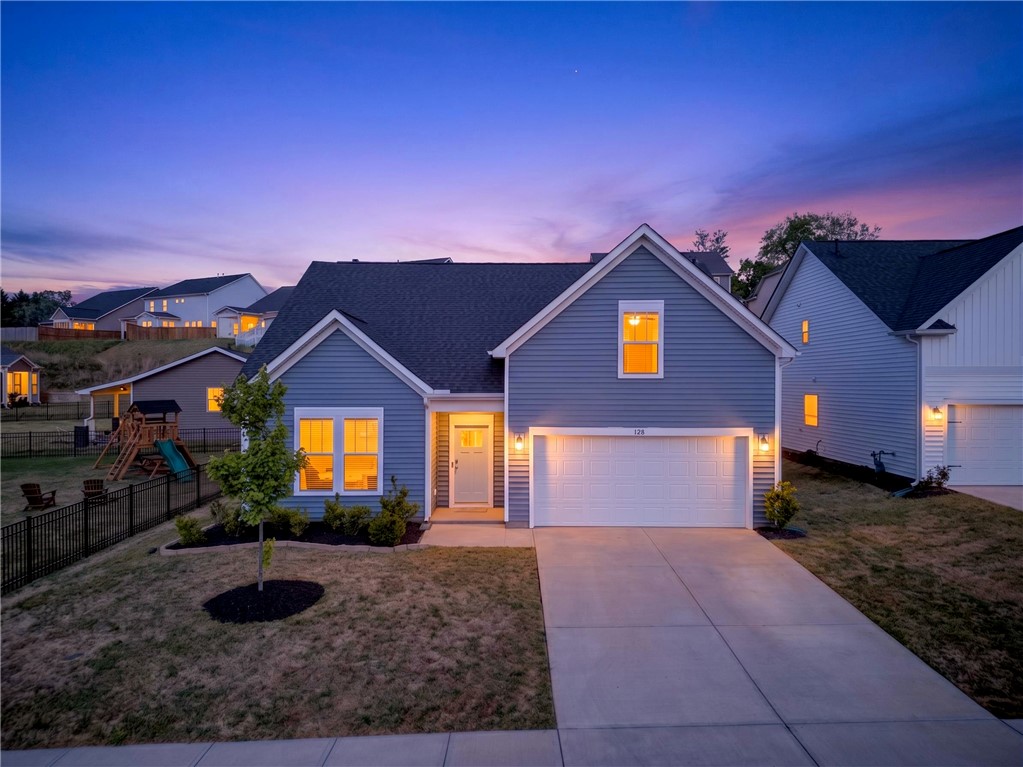 128 Whitman Way Easley, SC 29642 - Photo 32 of 34 This charming home offers curb appeal and a fenced yard, perfect for outdoor enjoyment.