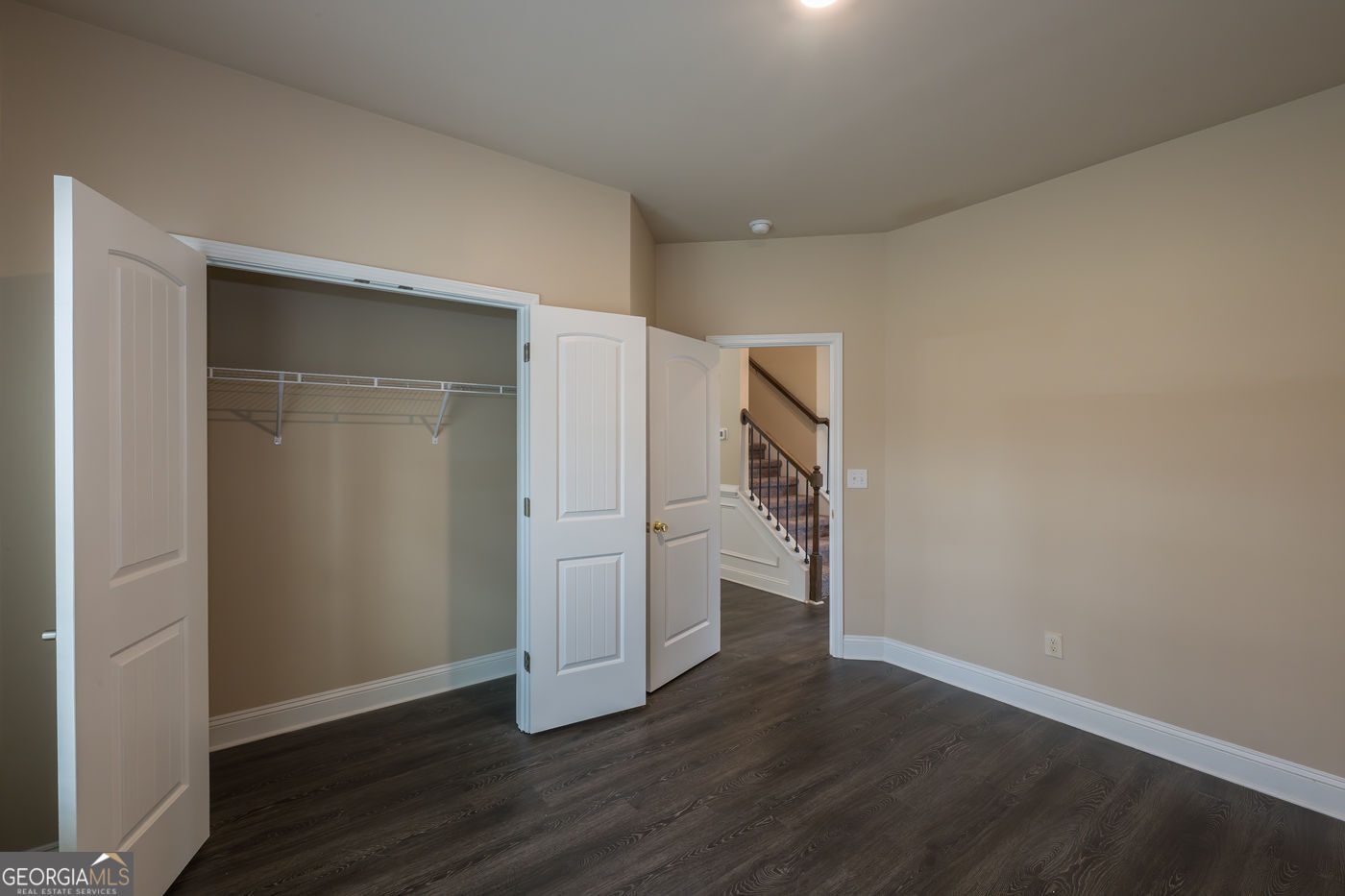 12172 Flannery Lane Hampton, GA 30228 - Photo 15 of 31 a view of empty room with wooden floor