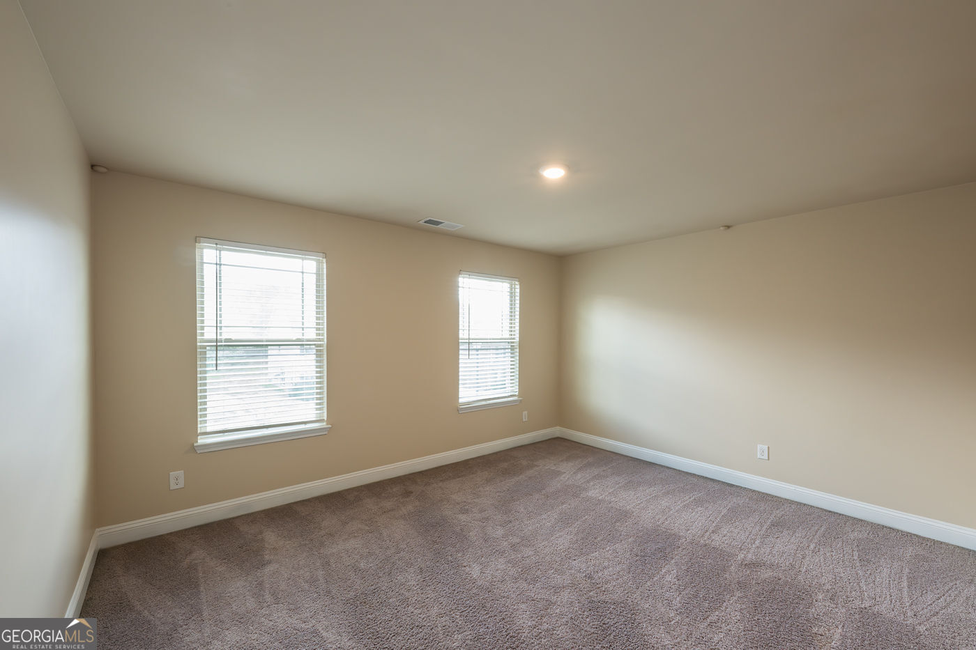 12172 Flannery Lane Hampton, GA 30228 - Photo 25 of 31 an empty room with windows