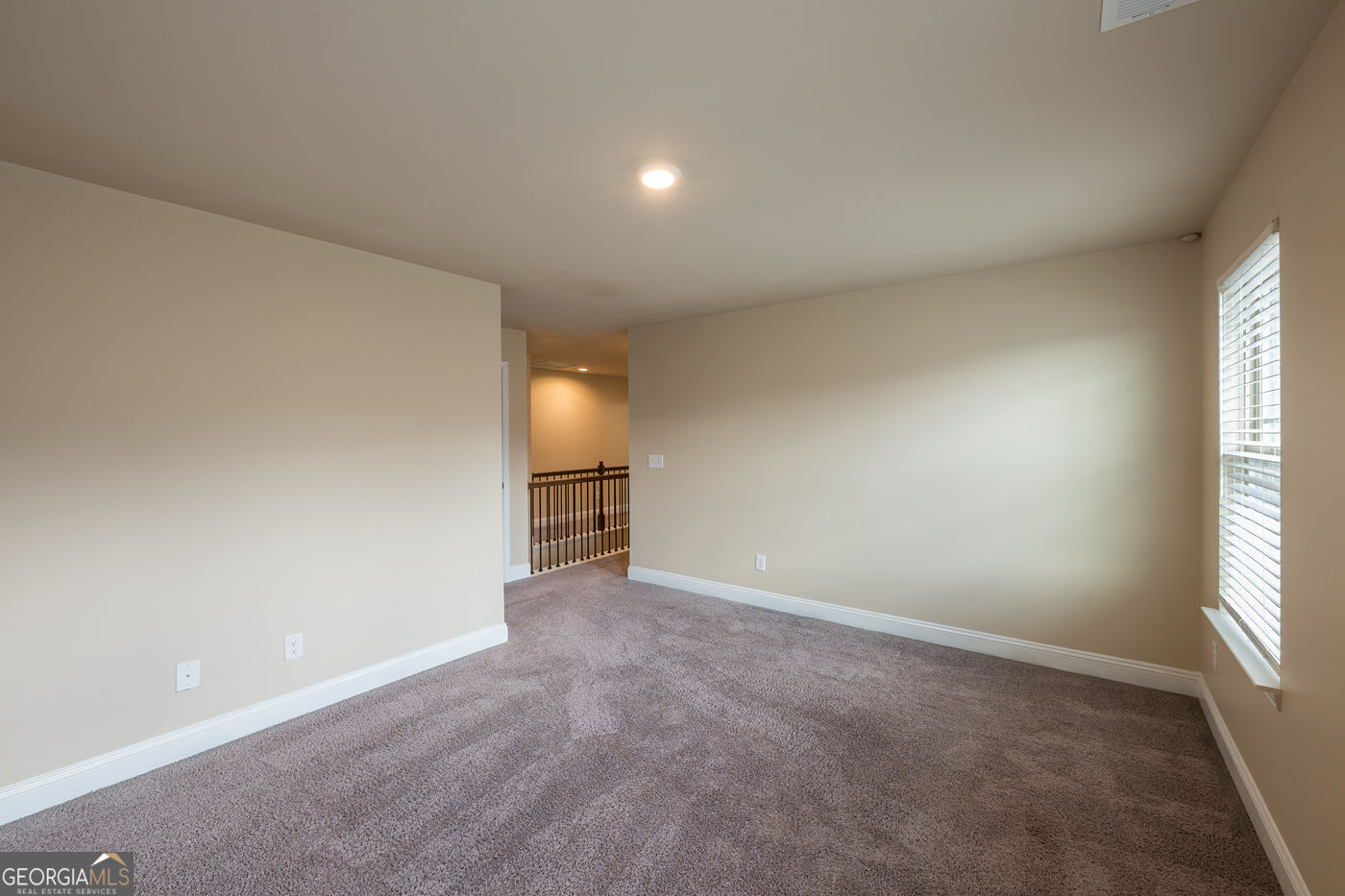 12172 Flannery Lane Hampton, GA 30228 - Photo 26 of 31 an empty room with windows and fireplace