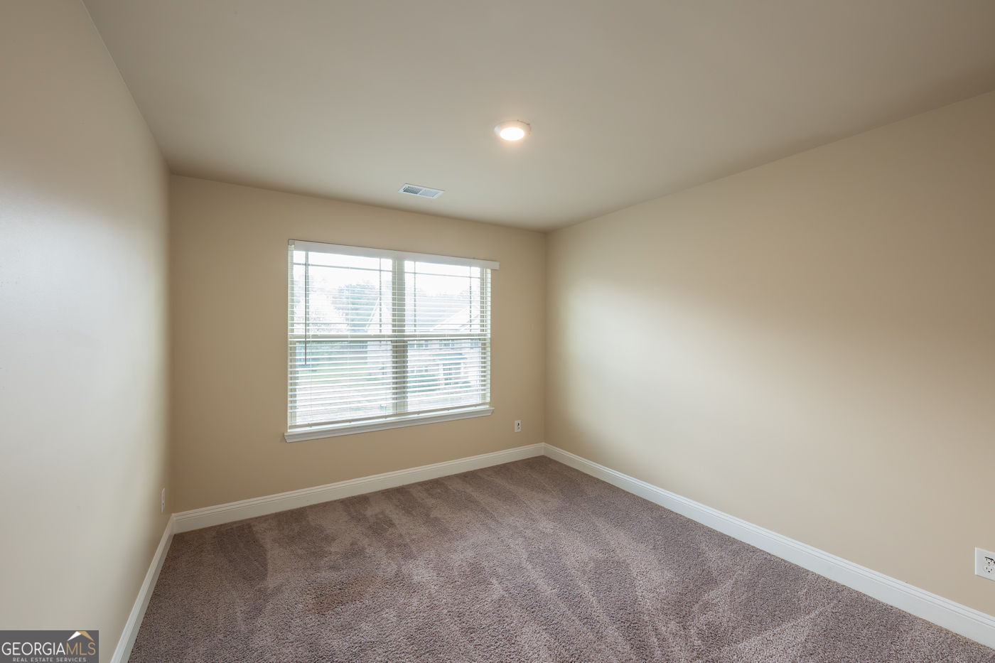 12172 Flannery Lane Hampton, GA 30228 - Photo 28 of 31 an empty room with a window