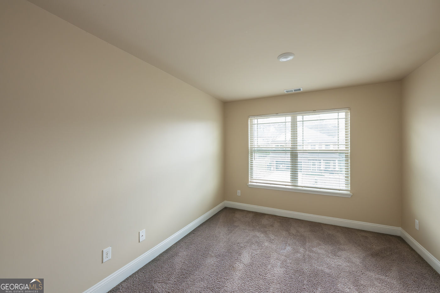 12172 Flannery Lane Hampton, GA 30228 - Photo 30 of 31 an empty room with a window