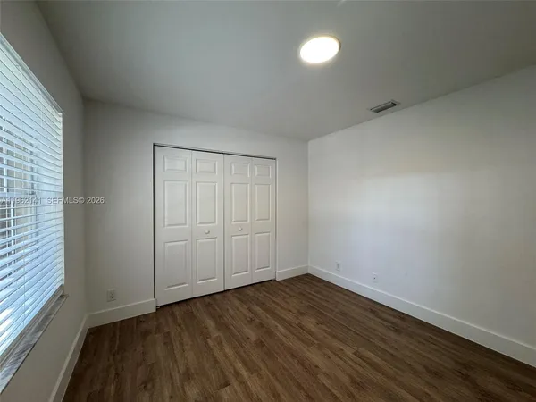 a bathroom with a sink and shower