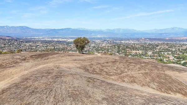 a view of an outdoor space with mountain view