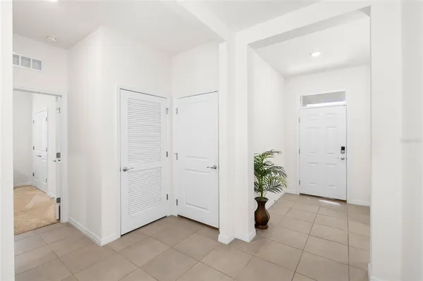 a view of entryway with white walls