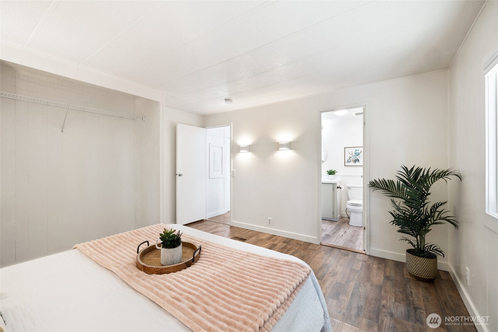 1527 East Roy Road Freeland, WA 98249 - Photo 12 of 24 a bedroom with a bed and a couch