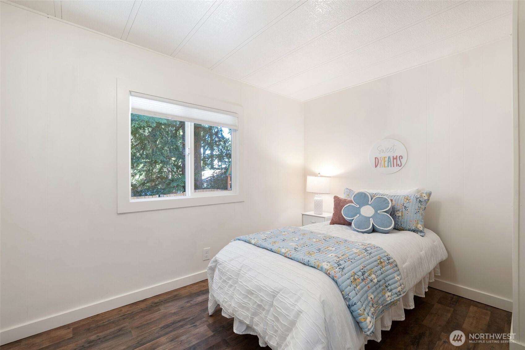 1527 East Roy Road Freeland, WA 98249 - Photo 14 of 24 a bedroom with a bed and a window