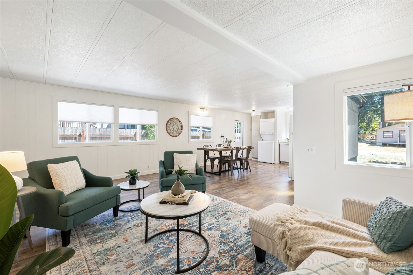 1527 East Roy Road Freeland, WA 98249 - Photo 2 of 24 a living room with furniture and a table
