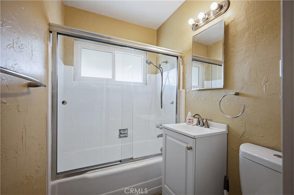 9805 Devon Street Rancho Cucamonga, CA 91730 - Photo 17 of 31 a bathroom with a sink a toilet and shower