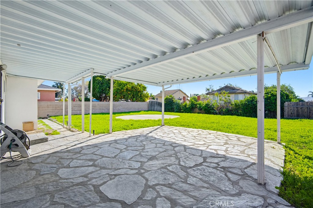 9805 Devon Street Rancho Cucamonga, CA 91730 - Photo 25 of 31 a view of a swimming pool with a yard
