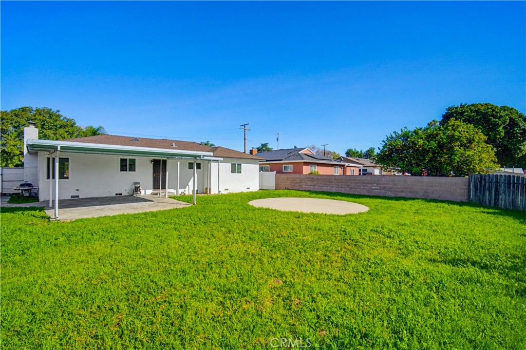 9805 Devon Street Rancho Cucamonga, CA 91730 - Photo 31 of 31 a view of a house with backyard porch and furniture