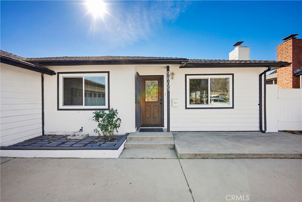 9805 Devon Street Rancho Cucamonga, CA 91730 - Photo 5 of 31 a front view of a house with garden